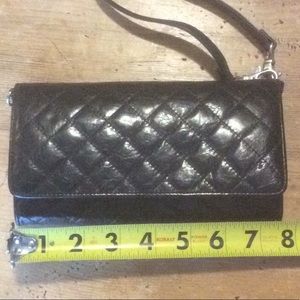 Hobo bag or wristlet. Great for day or night